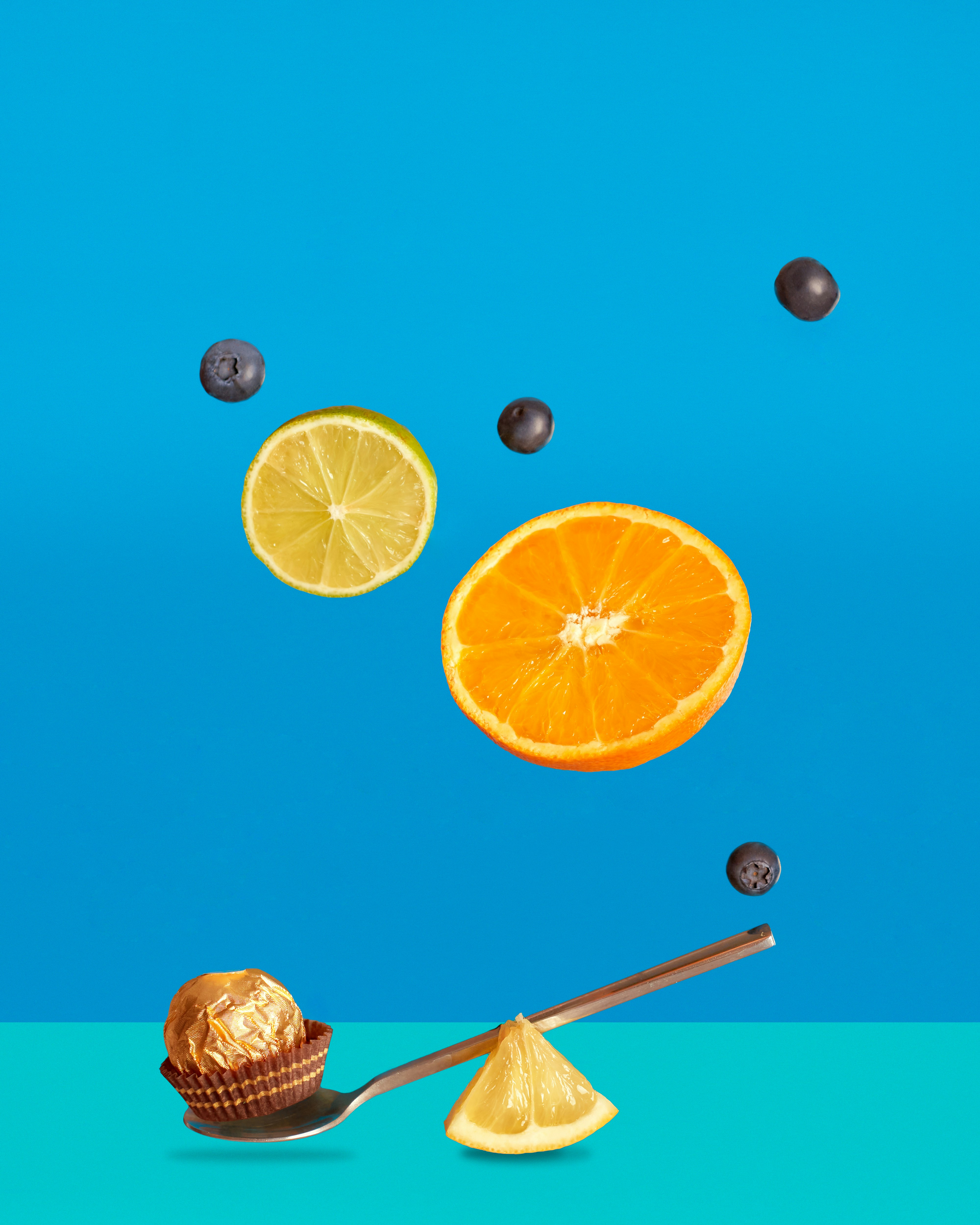 sliced lemon fruit on blue background